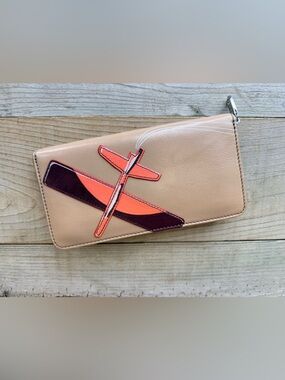 Fossil Beige Wallet with Orange and Dark Burgundy Airplane Applique